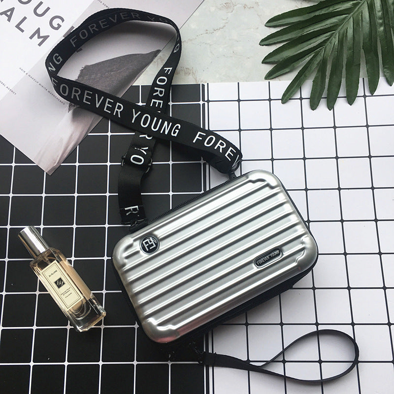 Factory direct sales seven inch cosmetic bag hard shell toiletry bag travel clutch bag portable storage bag PC mini suitcase