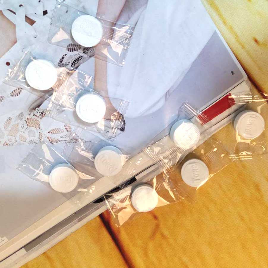 Disposable compressed towel individually wrapped candy cotton facial cleansing towel portable hotel travel compressed face towel