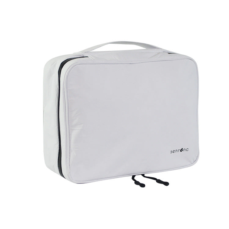 Manufacturer custom DuPont paper toiletry bag set for business trips, travel toiletries storage bag four-piece set of customized LOGO