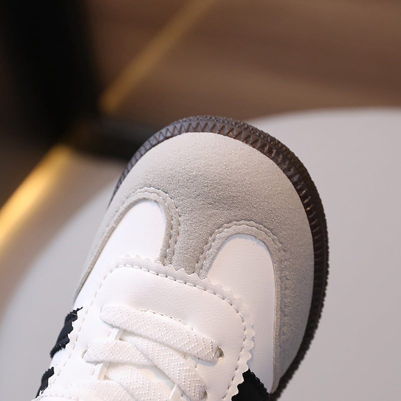 Children's sports shoes, spring and autumn, new boys' soft-soled color-blocked board shoes, girls' moral training shoes, casual running shoes, white shoes