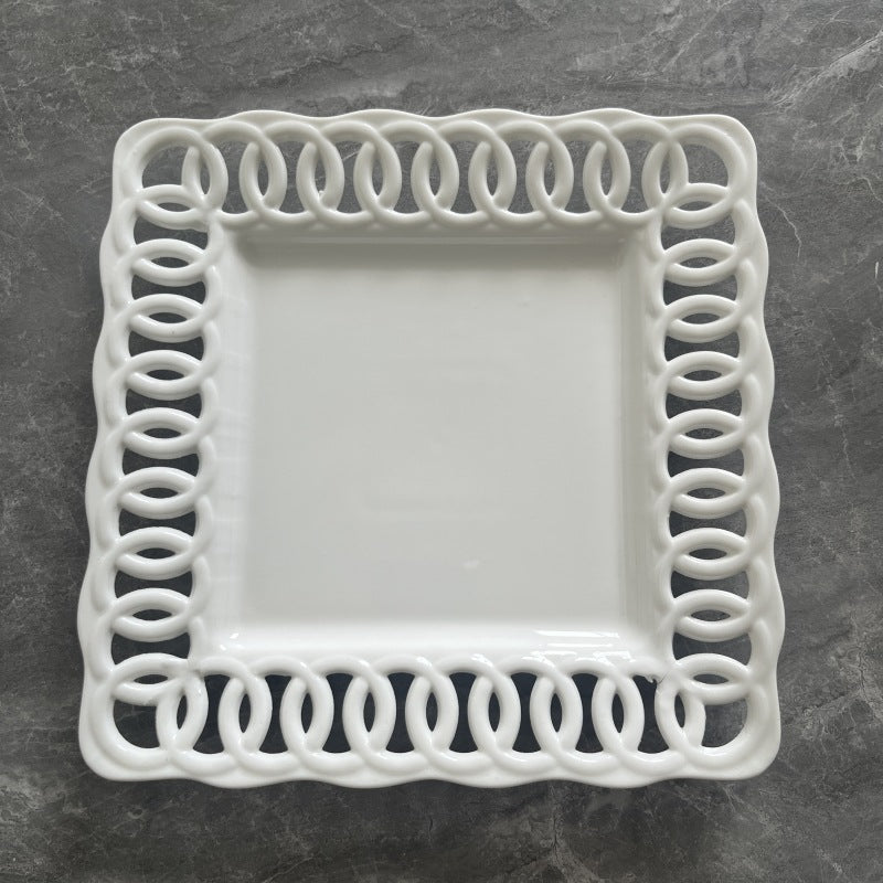 New product embossed ceramic hollow plate display plate fruit cake snack plate Western tableware manufacturer direct sales home restaurant