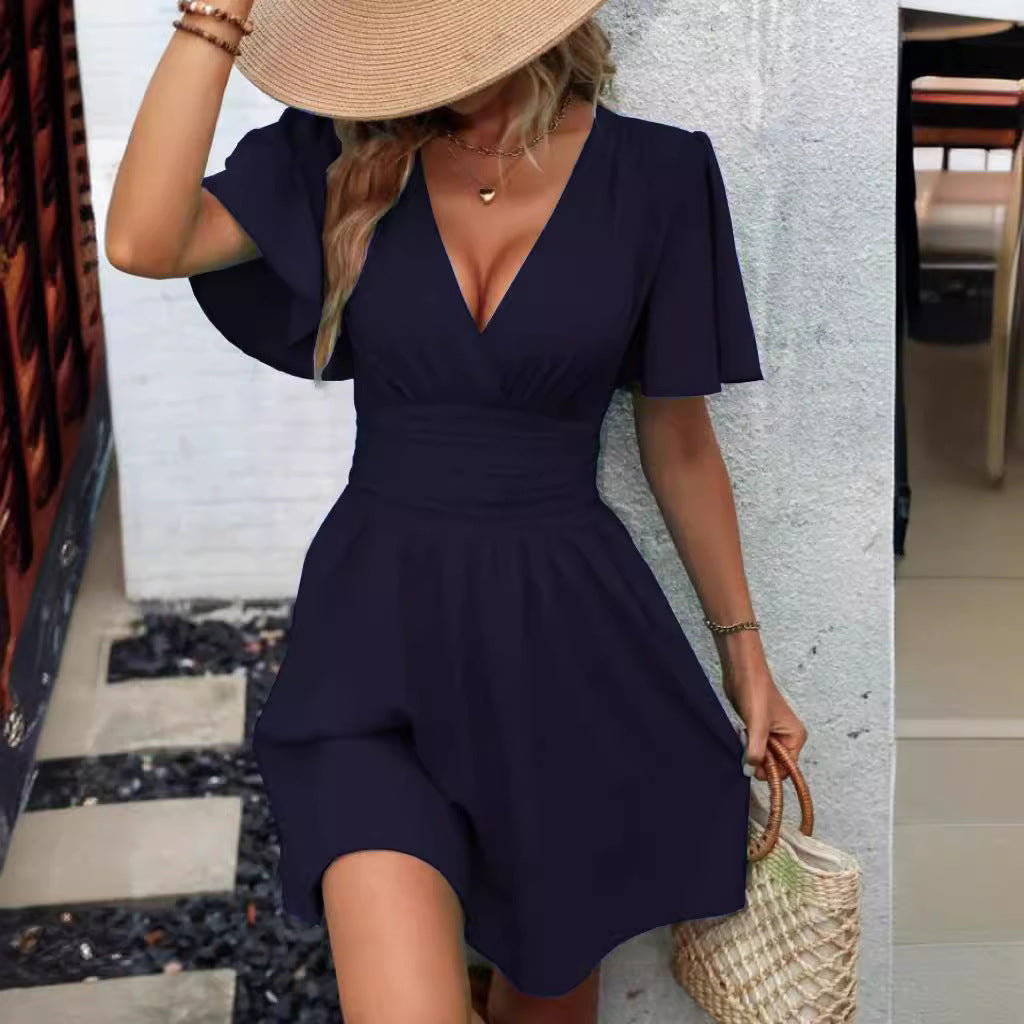 The new summer deep V-neck ruffled sleeve solid color wrap dress
