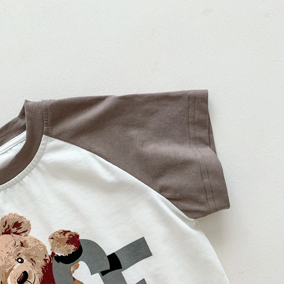Trendy thin summer Korean version loose men's treasure triangle bag fart clothes baby brown bear soft and comfortable cotton crawling clothes