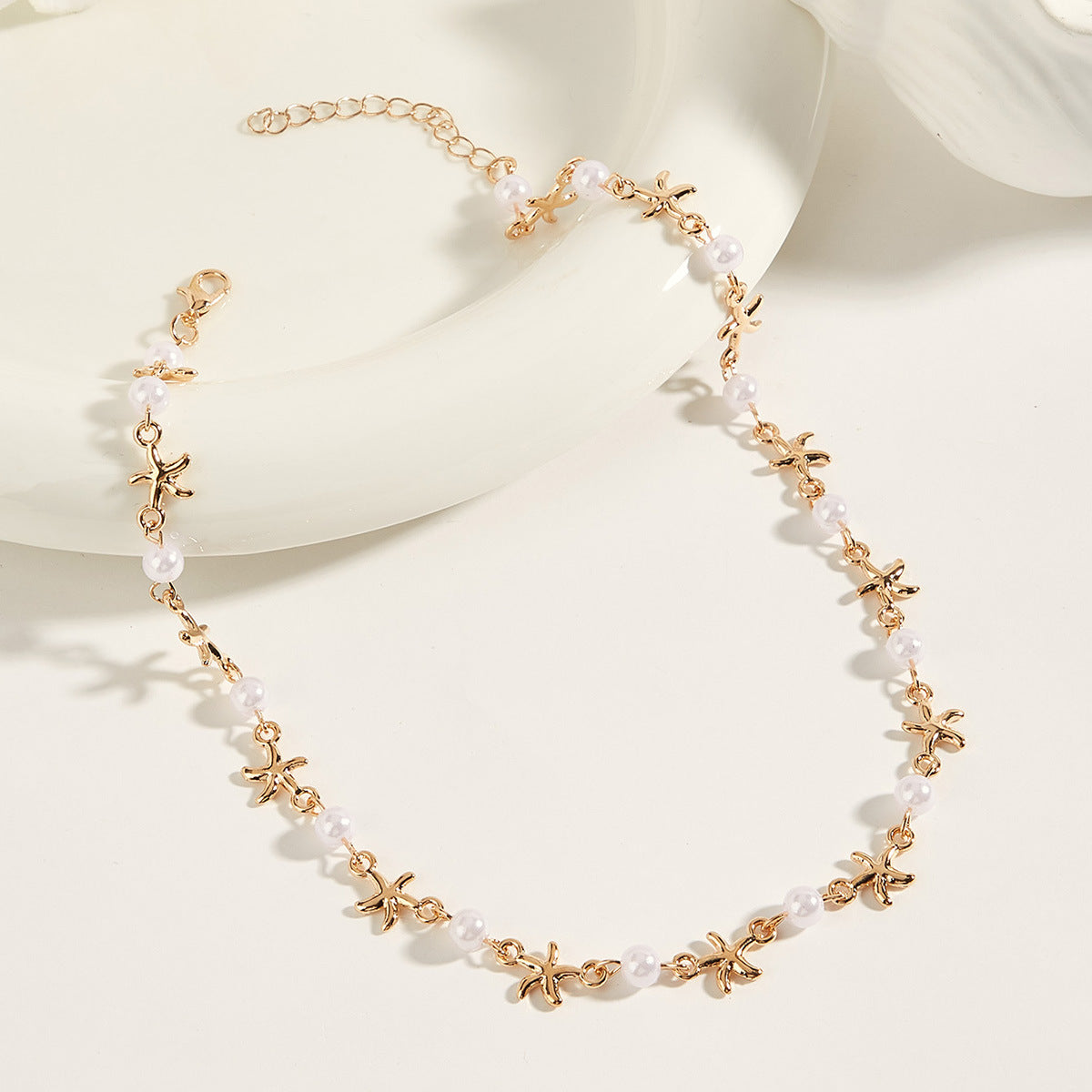 Cross-border jewelry, summer simple fashion, beach wind, starfish necklace, niche design, star imitation pearl beaded necklace
