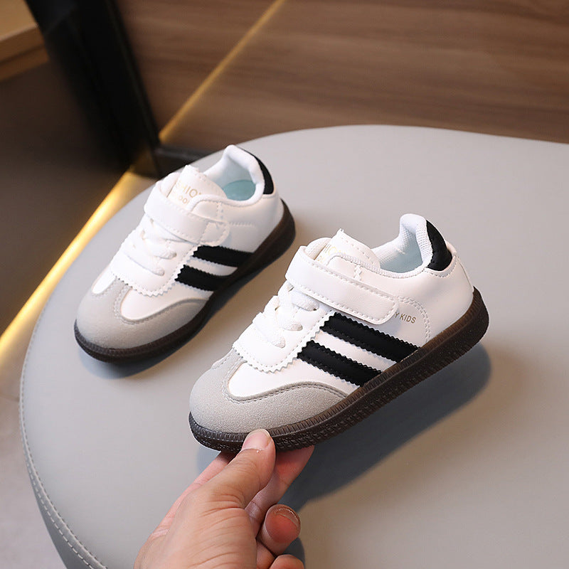 Children's sports shoes, spring and autumn, new boys' soft-soled color-blocked board shoes, girls' moral training shoes, casual running shoes, white shoes