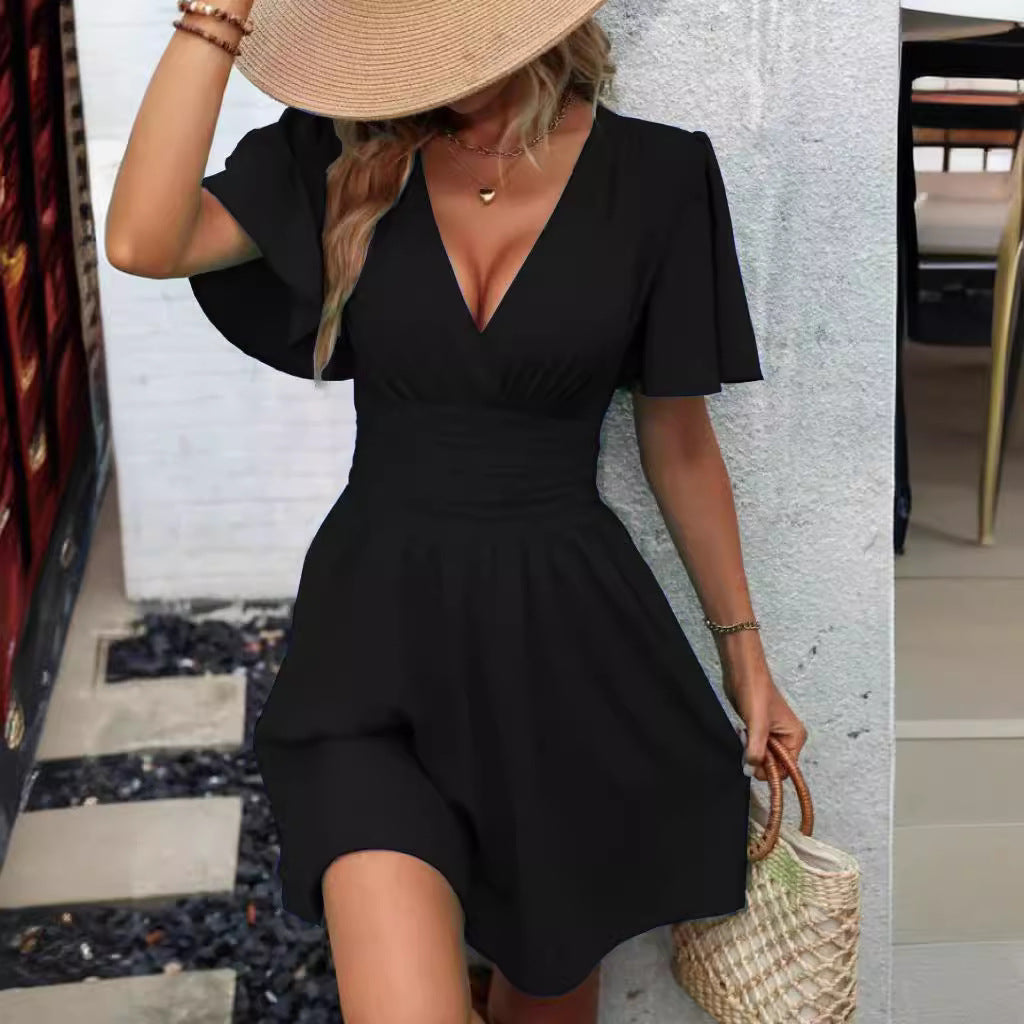 The new summer deep V-neck ruffled sleeve solid color wrap dress