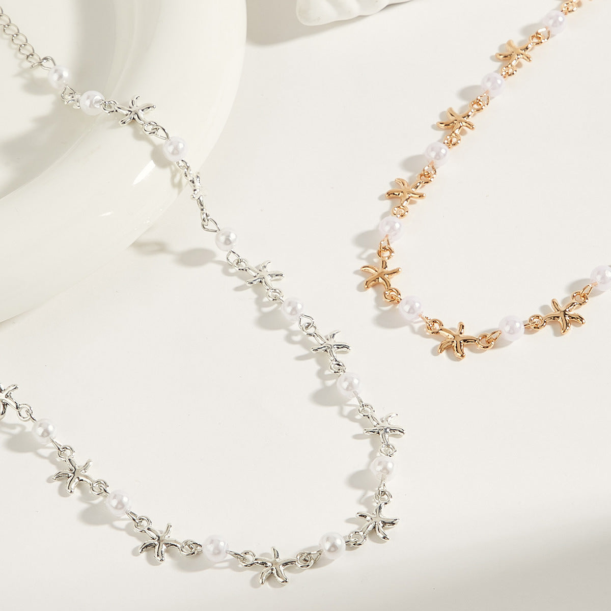 Cross-border jewelry, summer simple fashion, beach wind, starfish necklace, niche design, star imitation pearl beaded necklace