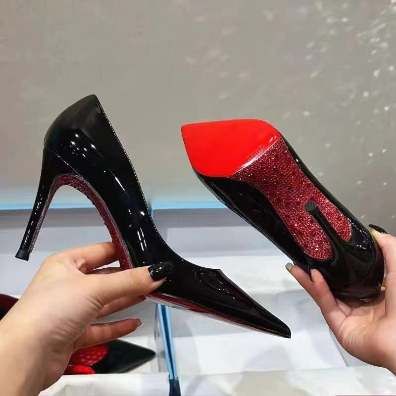 Side-hollow red bottom black high heels women's 2025 new sexy temperament nightclub stiletto heel pointed patent leather pumps