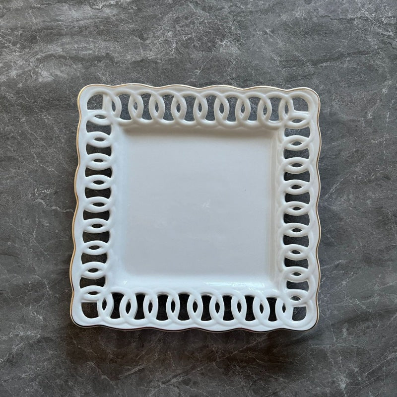 New product embossed ceramic hollow plate display plate fruit cake snack plate Western tableware manufacturer direct sales home restaurant