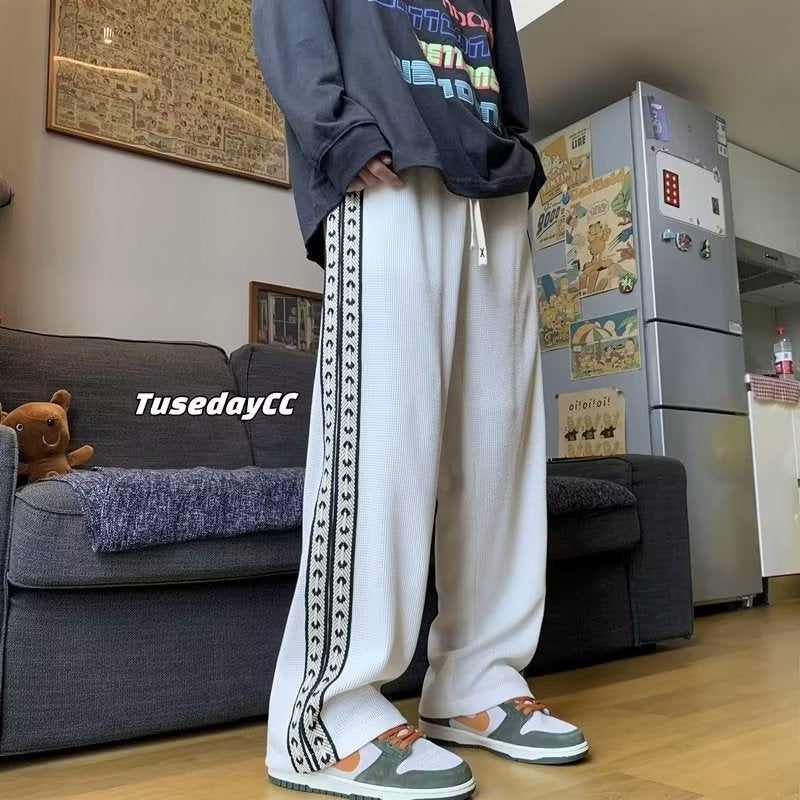 Men's extra large size 300 pounds plus size American high street waffle pants spring and autumn loose straight wide leg casual
