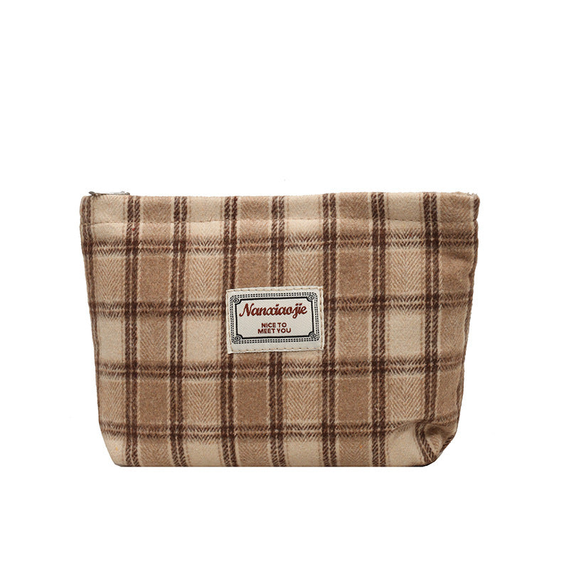 High-value hand-held cosmetic bag 2024 new large-capacity high-end sense of student travel storage toiletry bag