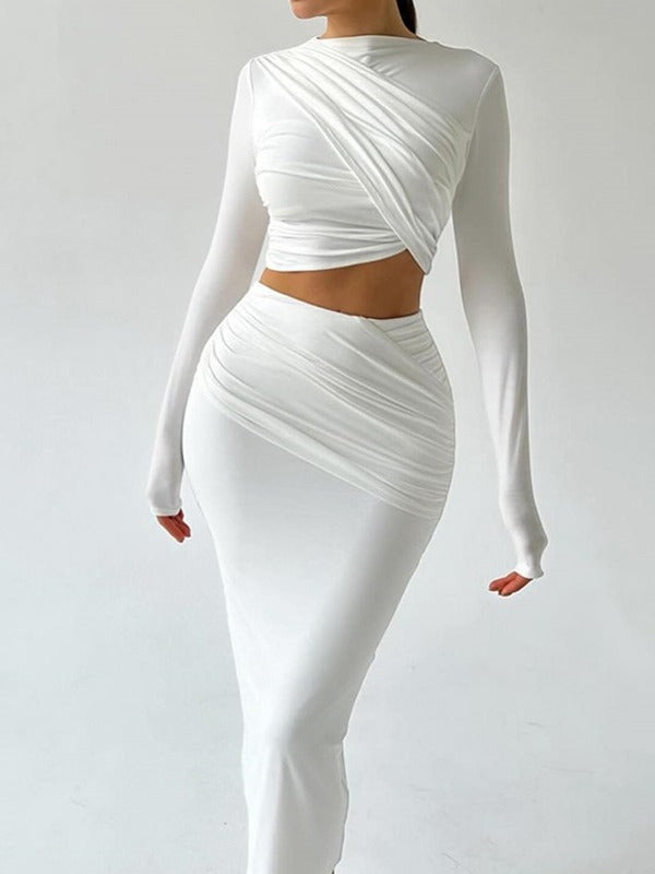 European and American style ins foreign trade solid color round neck irregular long sleeve crop top casual skirt two-piece set tide girl