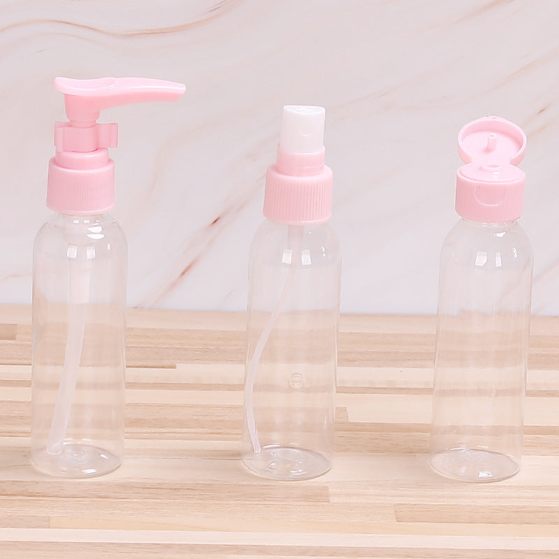 7 Piece Travel Dispensing Bottles Cosmetic Lotion Dispensing Bottles Plastic Pink Vacuum Bottles Clear Spray Bottles Wholesale