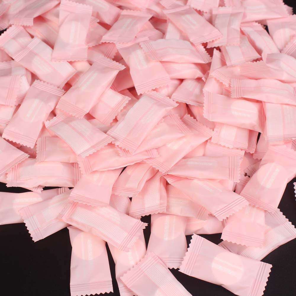 Disposable compressed towel individually wrapped candy cotton facial cleansing towel portable hotel travel compressed face towel
