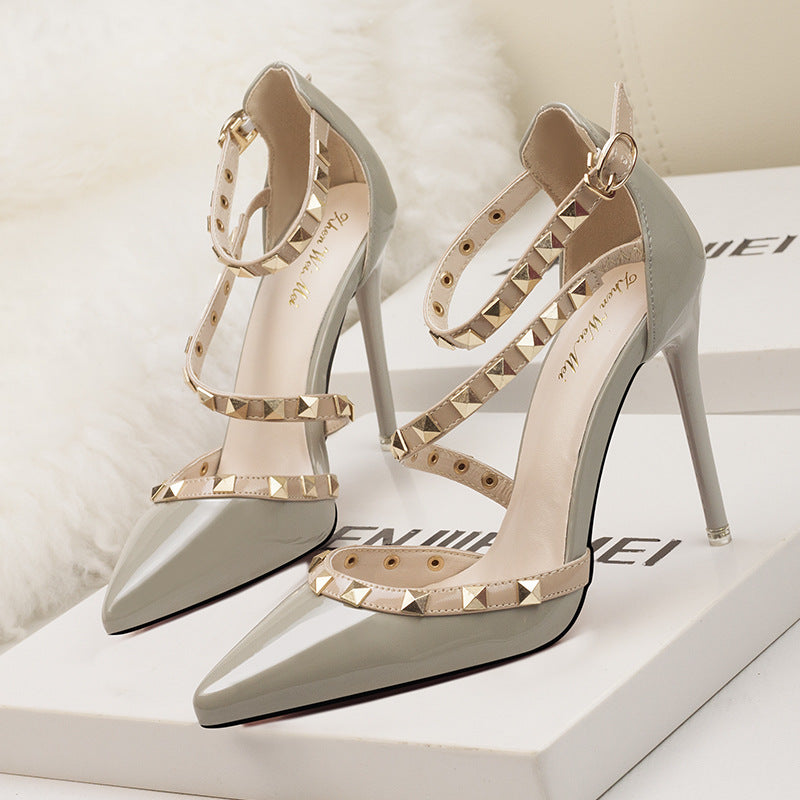 1138-13 European and American simple sexy nightclub stiletto high heels shallow mouth pointed toe rivet hollow sandals with a word