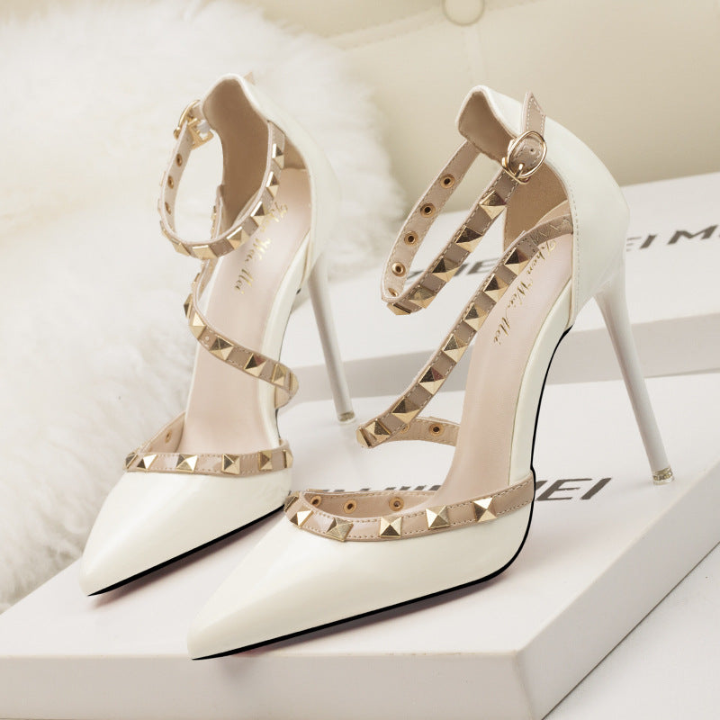 1138-13 European and American simple sexy nightclub stiletto high heels shallow mouth pointed toe rivet hollow sandals with a word