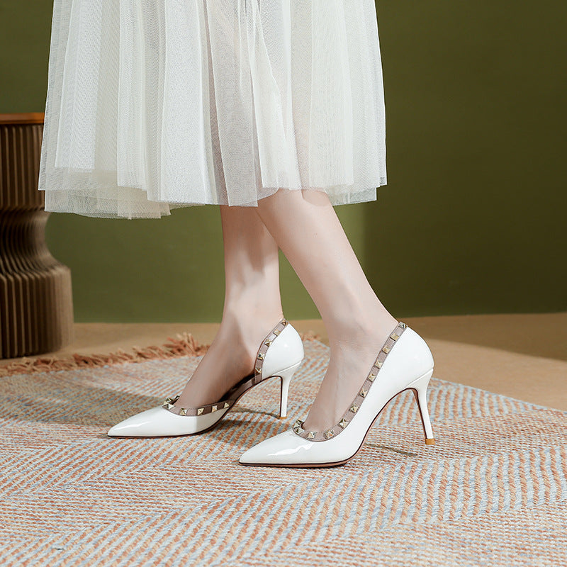 Nude patent leather high heels women's 2025 spring/summer sexy stiletto heels pointed toe side space rivet shoes with studded super high heels