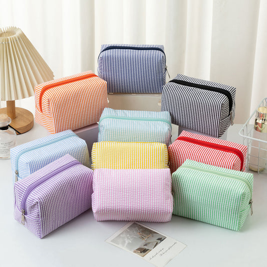 Cross-border hot selling seersucker cosmetic bag hand holding large capacity toiletry bag embroidered stripe travel cosmetics storage bag
