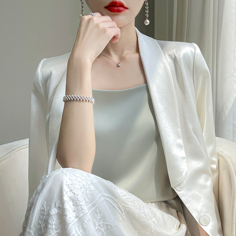The new summer 2023 suspender silk wear suit with acetate satin neckline temperament top and vest inside