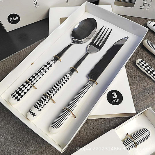 Wholesale ins tableware gift box set European supermarket tail goods ceramic handle knife fork spoon spoon mirror polished