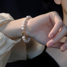 Real gold electroplated zircon four-petal flower bracelet ins sweet little fresh bracelet high-end niche hand ornament female wholesale