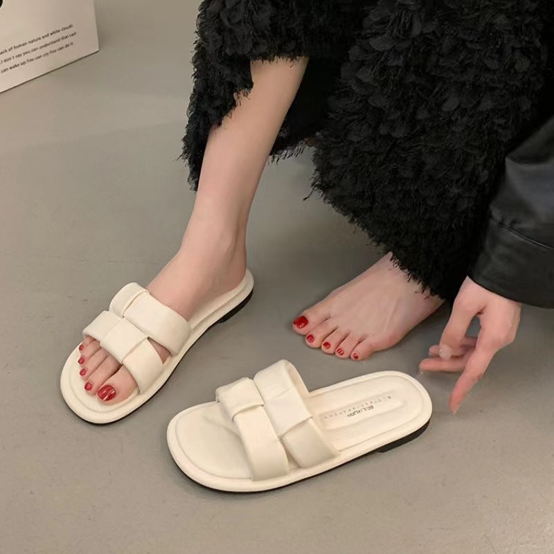 2024 new flat flat slotted sandals for wearing a sense of luxury student soft-soled beach slippers women's summer wholesale