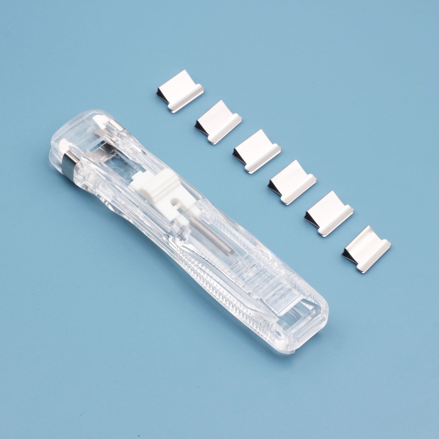 Factory wholesale office stationery medium push clip refill clip creative stapler needleless reusable