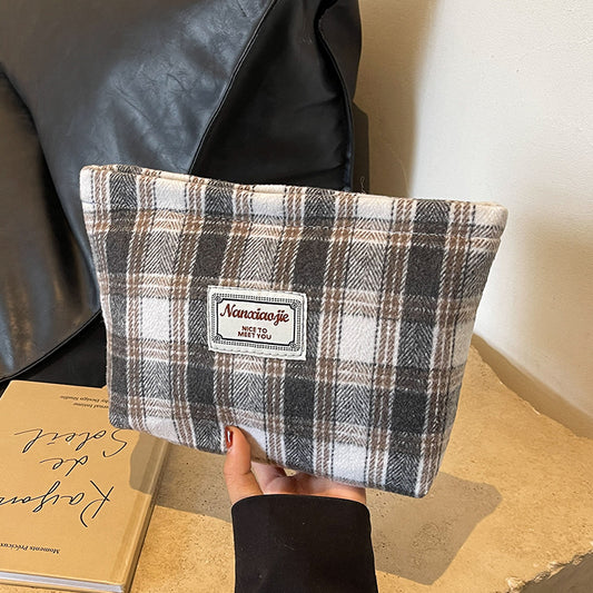 High-value hand-held cosmetic bag 2024 new large-capacity high-end sense of student travel storage toiletry bag