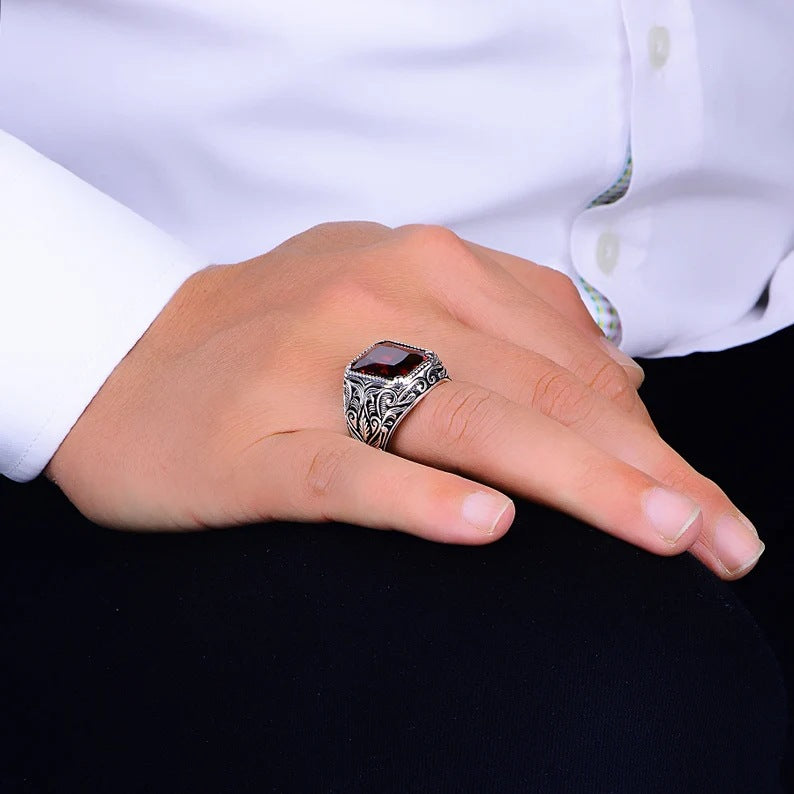 He is a silver new ring personality fashion European and American creative set square red zircon men's dating ring