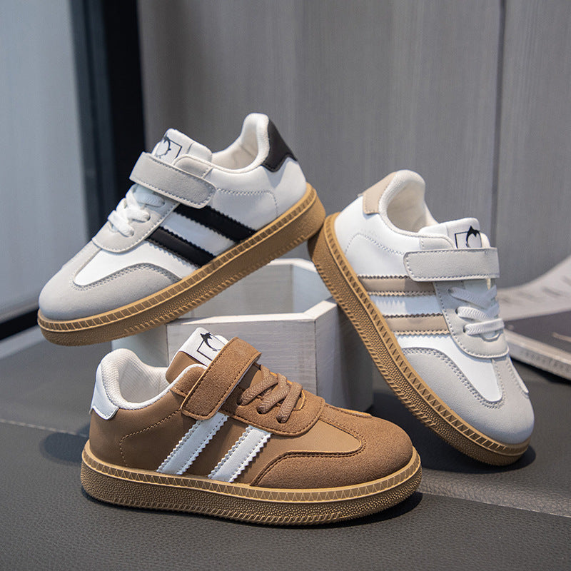 Children's sneakers 2025 spring and autumn new boys' versatile, non-slip and breathable student board shoes, children's soft-soled German training shoes