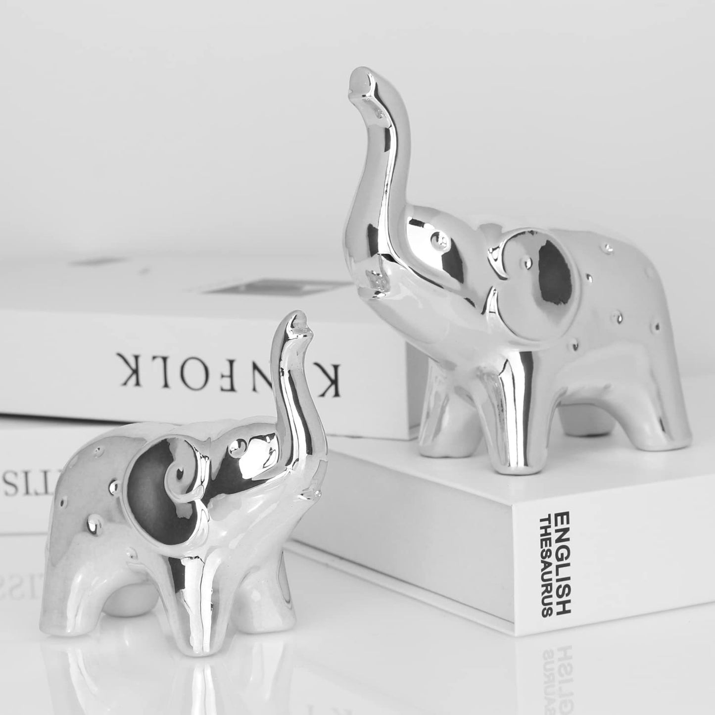 Cross-border modern silver elephant ceramic statue for living room, office, desktop bookshelf, TV cabinet, home decoration ornament