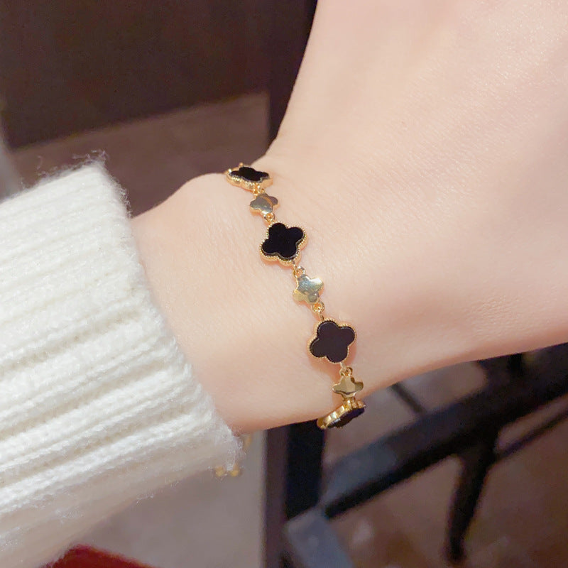 Japanese and Korean fashion temperament, light luxury, four-leaf flower bracelets, female Internet celebrities, versatile personality, small fresh hand jewelry, one piece of hair