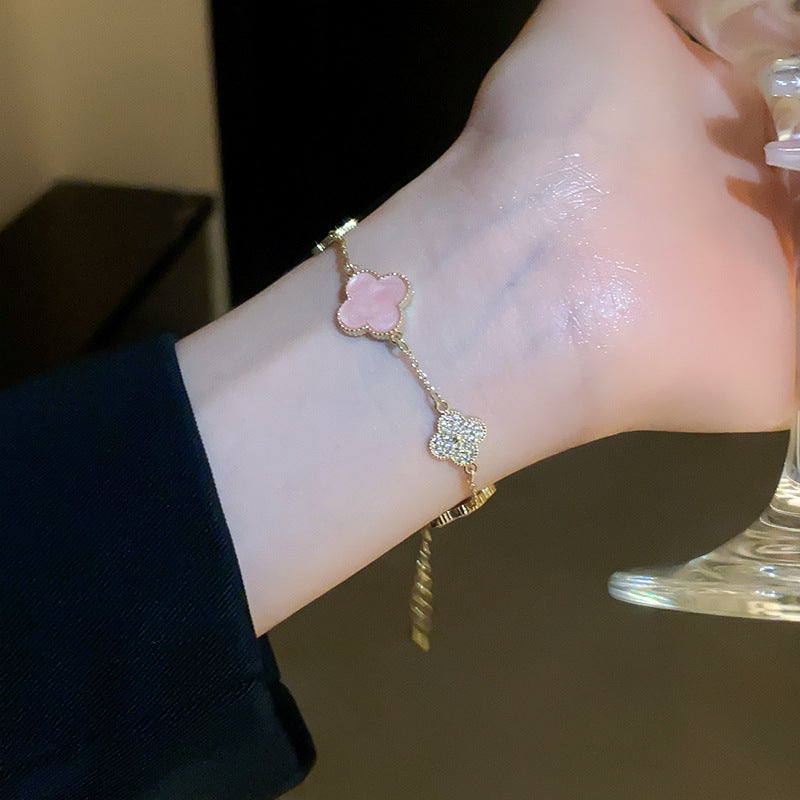Real gold electroplated zircon four-petal flower bracelet ins sweet little fresh bracelet high-end niche hand ornament female wholesale