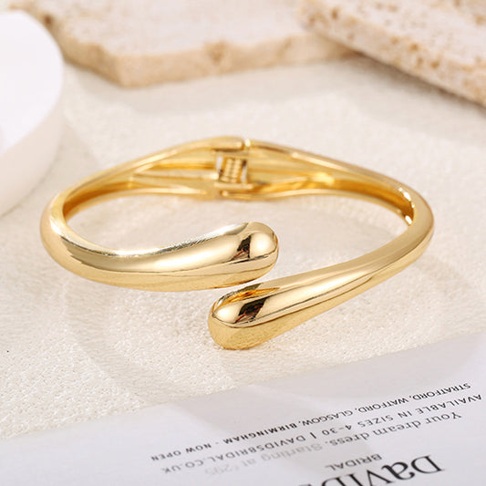 2025 cross-border European and American bracelet women's jewelry niche simple modern glossy bracelet does not fade women's alloy silver