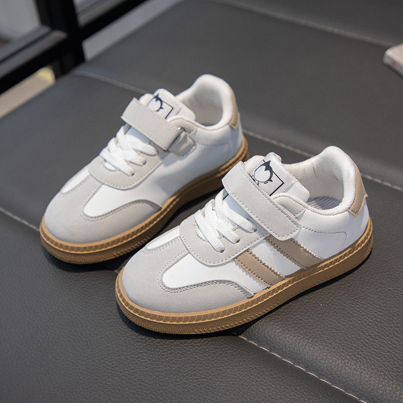 Children's sneakers 2025 spring and autumn new boys' versatile, non-slip and breathable student board shoes, children's soft-soled German training shoes