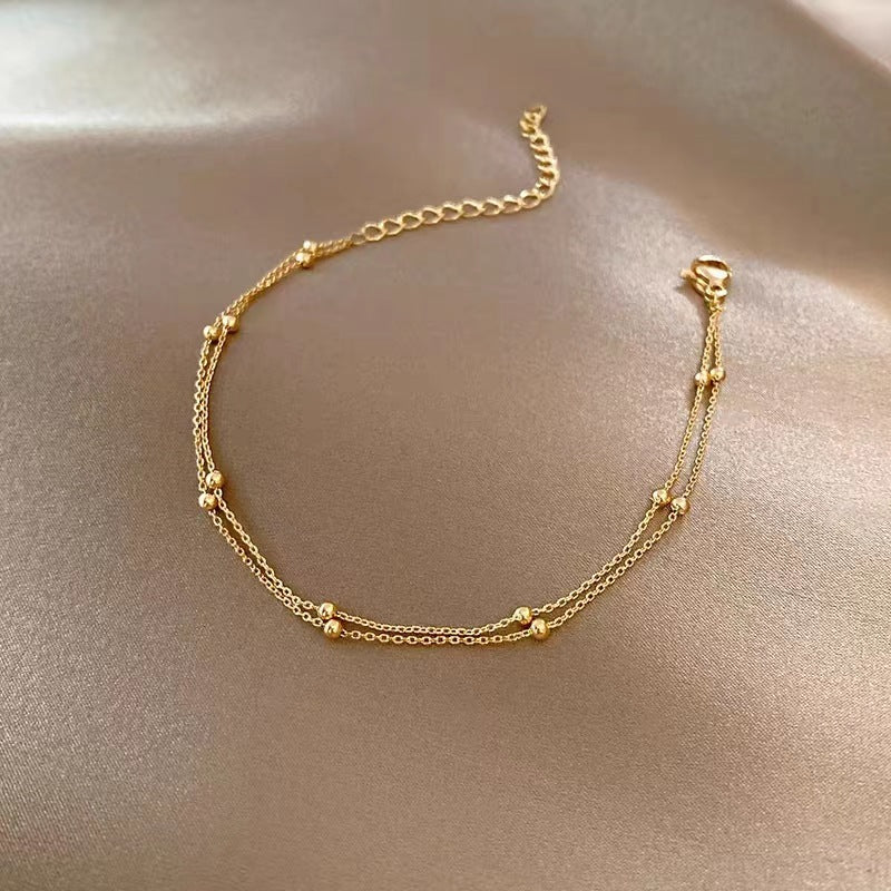 Double-layered lucky bead bracelet Anklet women's high-fashion, simple, individual, versatile, high-end niche bracelet