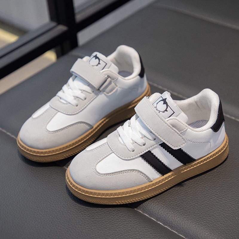 Children's sneakers 2025 spring and autumn new boys' versatile, non-slip and breathable student board shoes, children's soft-soled German training shoes