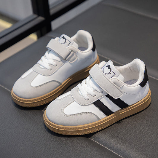 Children's sneakers 2025 spring and autumn new boys' versatile, non-slip and breathable student board shoes, children's soft-soled German training shoes
