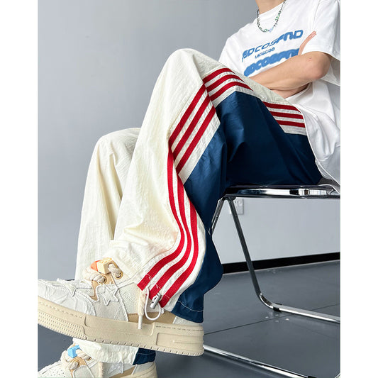 Ice silk quick-drying three-bar pants men's autumn American design sense niche color-block straight-leg loose casual sweatpants