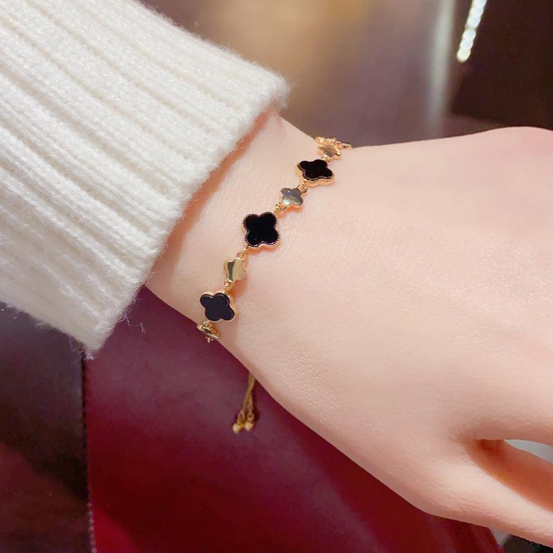 Japanese and Korean fashion temperament, light luxury, four-leaf flower bracelets, female Internet celebrities, versatile personality, small fresh hand jewelry, one piece of hair