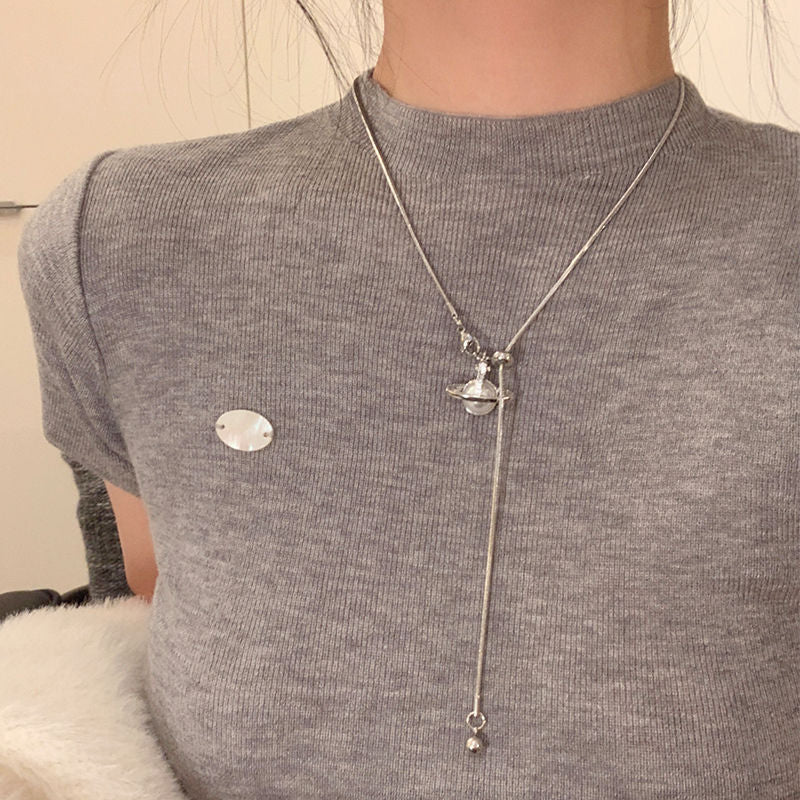 Versatile and fashionable delicate pearl planet pendant tassel sweater chain women's luxury unique long necklace necklace