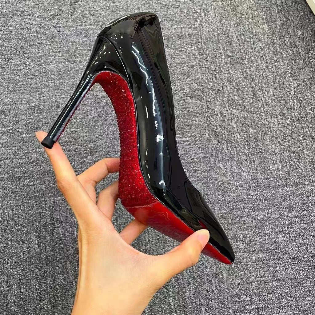 Side-hollow red bottom black high heels women's 2025 new sexy temperament nightclub stiletto heel pointed patent leather pumps