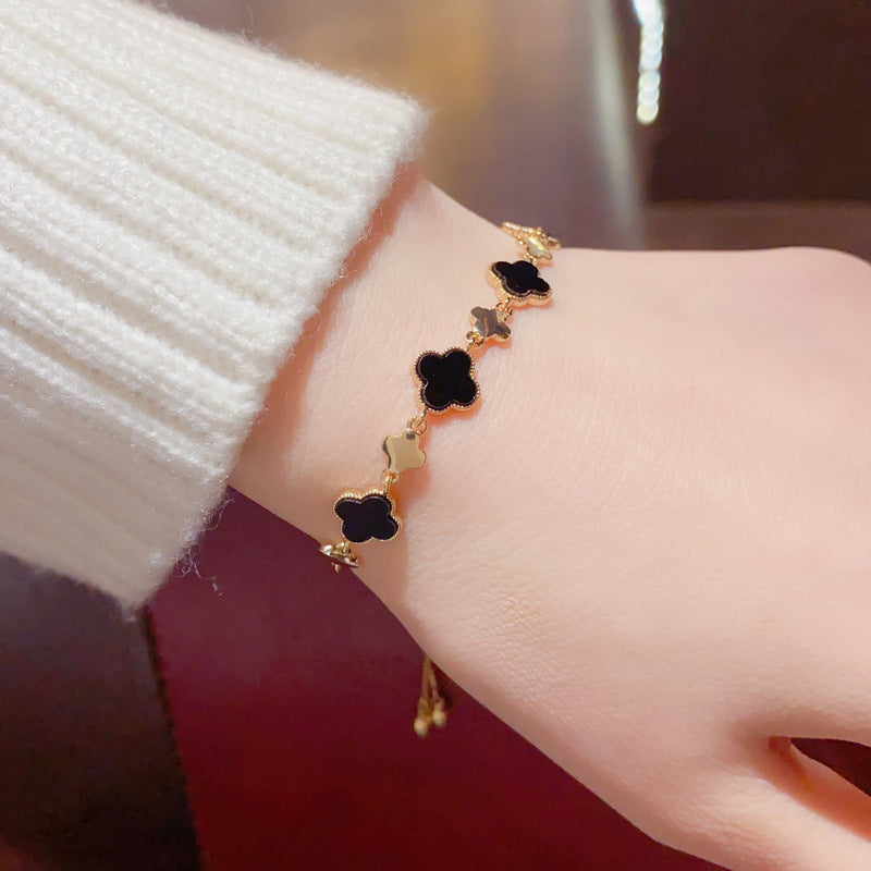 Japanese and Korean fashion temperament, light luxury, four-leaf flower bracelets, female Internet celebrities, versatile personality, small fresh hand jewelry, one piece of hair
