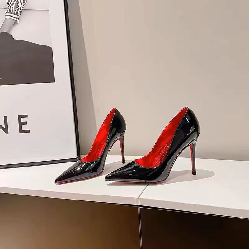 Side-hollow red bottom black high heels women's 2025 new sexy temperament nightclub stiletto heel pointed patent leather pumps