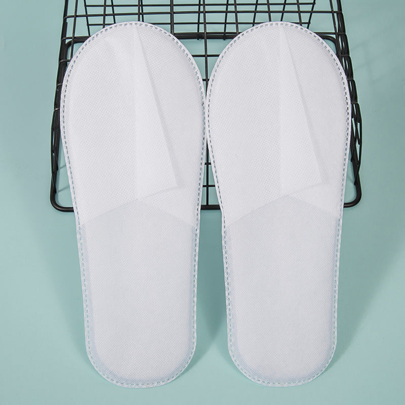 Hotels and guesthouses disposable slippers B&B thickened non-woven slippers high foam slippers manufacturers spot wholesale environmental protection