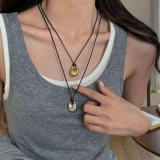 Nazha's same golden beanie black leather rope necklace women's cross-border new accessories are niche simple and high-end sweater chains