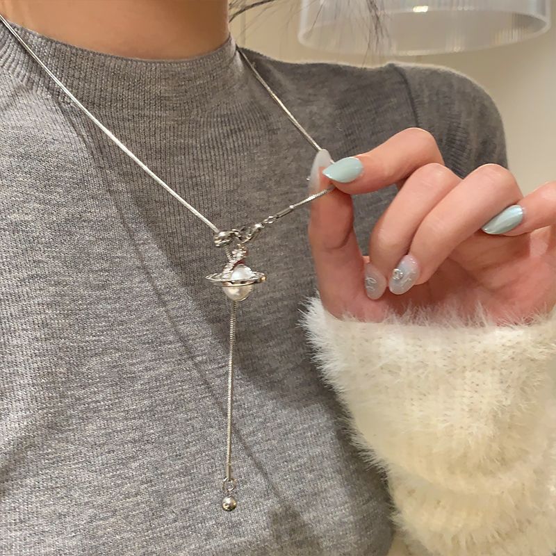 Versatile and fashionable delicate pearl planet pendant tassel sweater chain women's luxury unique long necklace necklace