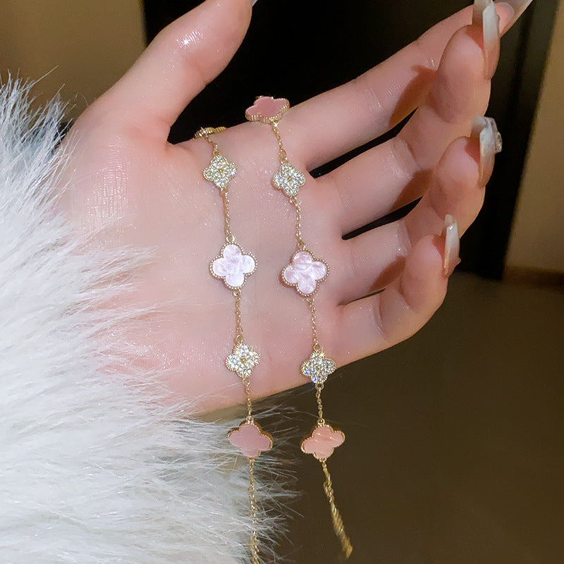 Real gold electroplated zircon four-petal flower bracelet ins sweet little fresh bracelet high-end niche hand ornament female wholesale