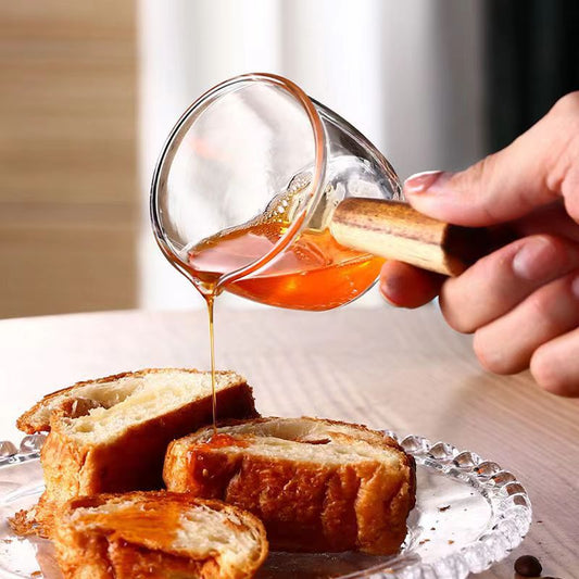 Wholesale Caffeine Glass Measuring Cup Transparent Strap Handle Mini Small Milk Jar Milk Cup Coffee Ware with Wooden Handle
