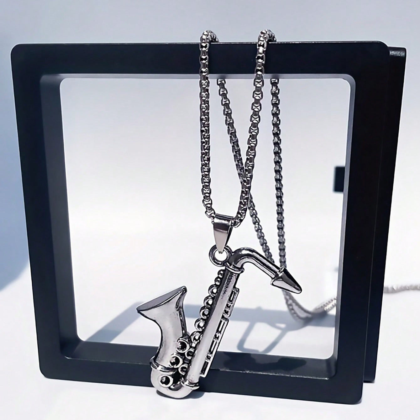 Hip-hop musical instrument saxophone pendant necklace cross-border explosive men's fashion personality necklace sweatshirt chain